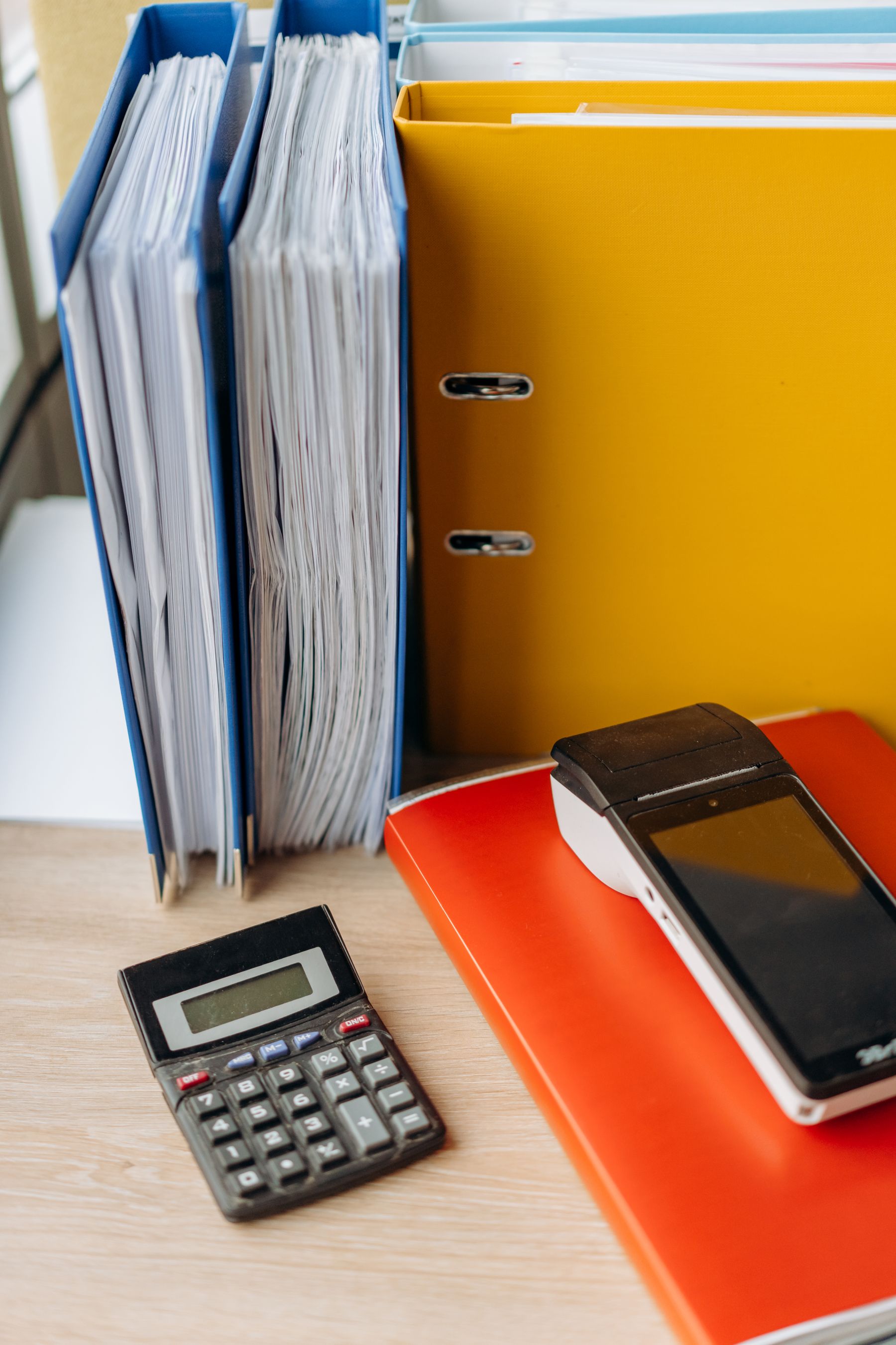 Organised files and a calculator on a workspace